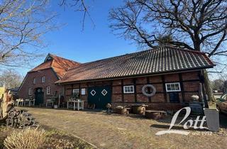 Bauernhaus kaufen in 26689 Apen, Ehemaliges Bauernhaus mit sanierter Wohnung und Ladenlokal (in der Diele) in Ortskernlage von Apen!