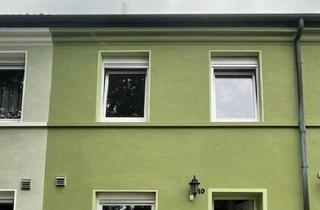 Reihenhaus kaufen in 59192 Bergkamen, Bergkamen - Reihenmittelhaus mit zwei Garagen