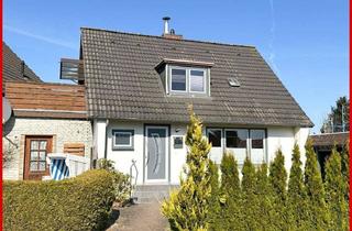 Doppelhaushälfte kaufen in 24837 Schleswig, In bevorzugter Stadtlage Schleswigs - Doppelhaushälfte mit Carport und Garten