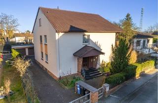 Haus kaufen in Franz-Seliger-Straße 12, 64331 Weiterstadt, Zweifamilienhaus mit viel Platz und Charme in Weiterstadt