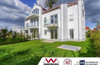 Wohnung kaufen in 85567 Grafing, Neuwertige Erdgeschosswohnung mit Garten und Terrassen
