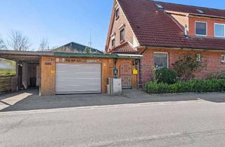 Haus kaufen in 25581 Hennstedt, Familienfreundliches 4 bis 5 Zimmer-Reihenendhaus mit großer Garage in Hennstedt (Kreis Steinburg)