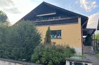 Haus kaufen in 63477 Maintal, Zweifamilienhaus mit zusätzlicher Souterrainwohnung in ruhiger Lage von Maintal-Wachenbuchen