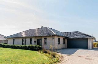 Haus kaufen in 24980 Schafflund, Pure Freude am Wohnen! Zukunftsorientierter Winkelbungalow mit großem Grundstück in Schafflund
