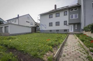 Wohnung kaufen in 97456 Dittelbrunn, Charmante 4-Zimmerwohnung im ersten Obergeschoss mit Balkon und Gartenanteil