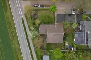 Einfamilienhaus kaufen in 26203 Wardenburg, Wardenburg - Idyllisches Einfamilienhaus mit großem Garten und Ausbaupotenzial in ruhiger Lage von Tungeln