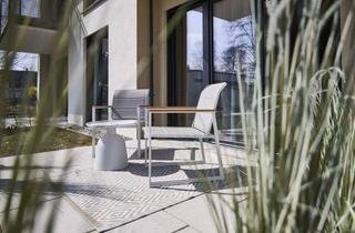 Wohnung kaufen in 85609 Aschheim, AB 38 - Charmante 2 Zimmer Wohnung mit Terrasse und kleinem Garten