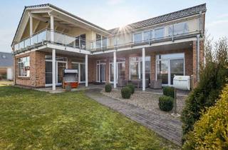 Haus kaufen in 25779 Hennstedt, Exklusive Wasserfront-Immobilie: Ihr Rückzugsort in bester Lage in Hennstedt