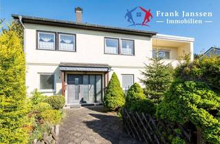 Einfamilienhaus kaufen in 54568 Gerolstein, Freistehendes Einfamilienhaus in Gerolstein-Büscheich - mit Garage, Garten, Terrasse & Balkon