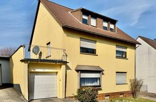 Haus kaufen in 56220 Bassenheim, 3 WOHNUNGEN, GARAGE, GARTEN, voll vermietet