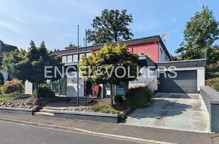Haus kaufen in 56235 Ransbach-Baumbach, Modernisiertes Wohngebäude mit Büroeinheit und schöner Gartenanlage