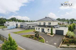 Haus kaufen in 49661 Cloppenburg, **Vielseitiges Anwesen mit luxuriösem Wohnkomfort und Gewerberaum in Cloppenburg!**