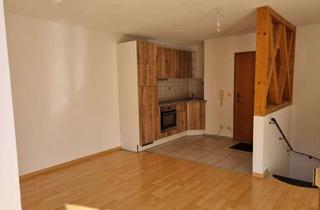 Wohnung kaufen in 83624 Otterfing, Gemütliche 2 Zimmer Maisonette Wohnung mit Terrasse und eingewachsenem Garten