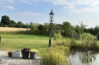 Haus kaufen in 24879 Neuberend, Neuwertiger Bungalow in traumhafter Sonnenlage – Modernes Wohnen inmitten der Natur