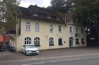 Mehrfamilienhaus kaufen in 33334 Gütersloh, Gepflegtes Mehrfamilienhaus mit drei Wohneinheiten und einer Gastromiefläche in GT-Hollen!