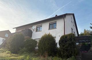 Haus kaufen in 97503 Gädheim, Gädheim - Zweifamilienwohnhaus mit großem Garten und Nebengebäude