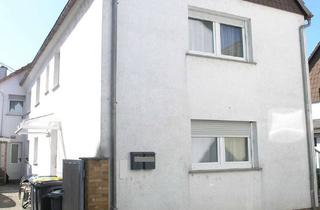 Anlageobjekt in 61206 Wöllstadt, Wöllstadt - Haus mit 2 separaten Wohnungen; Terrasse, Kamin und Garage