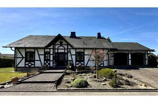Haus kaufen in 56858 Peterswald-Löffelscheid, Repräsentativer Winkelbungalow mit großer Terrasse, Sauna, 2 Garagen und zusätzlichem Bauplatz