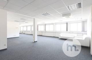 Gewerbeimmobilie kaufen in 85764 Oberschleißheim, Multifunktionales Gewerbeobjekt mit großzügiger Nutzfläche & Wohneinheit – direkt im Gewerbegebiet
