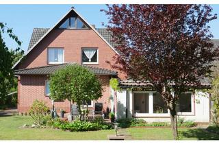 Haus kaufen in 49637 Menslage, Zweifamilienhaus in Menslage mit Aubaureserve