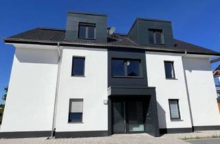 Wohnung kaufen in 32584 Löhne, Moderne Eigentumswohnung mit Terasse