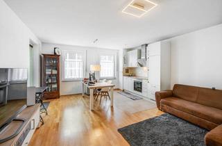 Wohnung kaufen in 80639 München, AIGNER - Helle 2-Zimmer-Wohnung mit Loggia in begehrter Lage Nymphenburgs