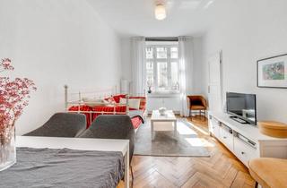 Wohnung kaufen in 80469 München, AIGNER - Charmante 2-Zimmer-Altbauwohnung in Bestlage