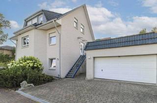 Haus kaufen in Zum Westberg, 31188 Holle, Für Eigennutzung und Vermietung: EFH mit großzügigen Räumen und Einliegerwohnung in ruhiger Lage