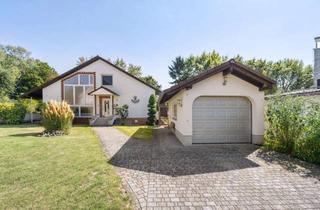 Einfamilienhaus kaufen in Ilbenstädter Straße 17, 61206 Wöllstadt, Großzügiges Einfamilienhaus auf idyllischem Grundstück in Nieder-Wöllstadt