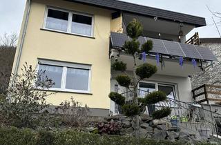 Einfamilienhaus kaufen in Bausenbergweg 10, 56651 Niederzissen, Vermietetes, geräumiges Einfamilienhaus mit Garge in Niederzissen.