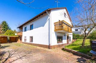 Haus kaufen in Ringstraße, 35041 Marburg, Potentialreiches Zweifamilienhaus mit Anbau in schöner Lage von Marburg-Michelbach