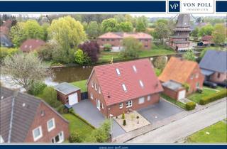 Doppelhaushälfte kaufen in Heckenweg 5a, 26759 Hinte, Traumhafte Wasserlage trifft moderne Effizienz – DHH in KfW 50 Bauweise