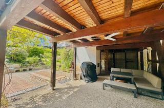Wohnung kaufen in 71263 Weil der Stadt, Weil der Stadt - 2,5 Zimmer-Wohnung mit herrlichem Garten und überdachter Terrasse
