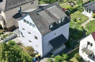 Anlageobjekt in Am Stadtwall 20, 35510 Butzbach, Kapitalanlage oder teilweiser Selbstbezug, Dreifamilienhaus mit großem Garten