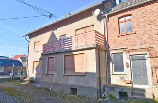 Bauernhaus kaufen in 65558 Flacht, Wohnhaus mit Nebengebäuden auf großem Grund