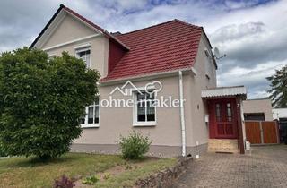 Doppelhaushälfte kaufen in 18465 Tribsees, Doppelhaushälfte mit Garten und Garage in Tribsees