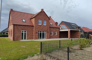 Wohnung kaufen in 26506 Norden, Neues Wohnhaus mit Erd- und Dachgeschßwohnung in Meeresnähe