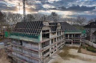 Wohnung kaufen in 47475 Kamp-Lintfort, Haus BERTA Kamp-LintfortNeubau 3 Zimmer Dachgeschoss Wohnung mit offener Küche und Loggia