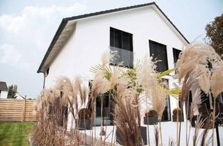 Einfamilienhaus kaufen in 03130 Spremberg, Baugrundstück mit Neubau - Einfamilienhaus in schöner Lage