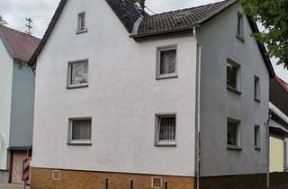 Haus kaufen in 65207 Rambach, Renditeobjekt oder Familienidyll: 3-Parteienhaus in naturnaher Lage von Rambach