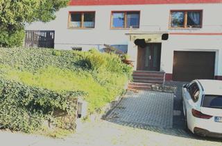 Doppelhaushälfte kaufen in 04600 Altenburg, Doppelhaushälfte mit Garage und Keller und großem teilbaren Grundstück in Altenburg zu verkaufen
