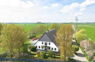Haus kaufen in 25370 Seester, Reetgedecktes Landgut mit zwei Wohneinheiten und XXL Garage