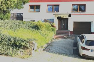 Doppelhaushälfte kaufen in 04600 Altenburg, Doppelhaushälfte mit Garage und Keller und großem teilbaren Grundstück in Altenburg zu verkaufen