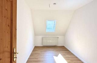 Wohnung kaufen in 79295 Sulzburg, Großzügige 4-Zimmer-Wohnung mit zusätzlicher DG-Wohnung und Garagen