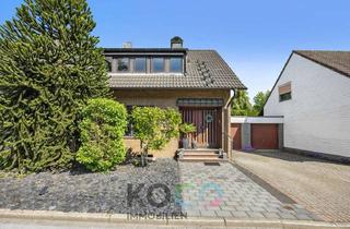 Doppelhaushälfte kaufen in 40822 Mettmann, Modernisierte Doppelhaushälfte mit Gartenidylle in Mettmann-Metzkausen!