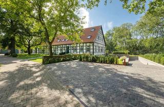 Villa kaufen in 49492 Westerkappeln, Haushälfte der Extraklasse - Villa im Fachwerk-Stil