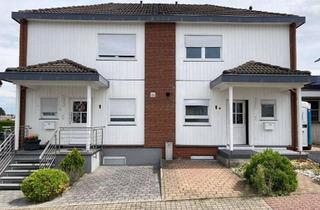 Doppelhaushälfte kaufen in 61118 Bad Vilbel, **modernisierte Doppelhaushälfte mit Einliegerwohnung in ruhiger und familiärer Lage**