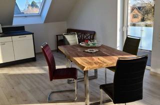 Wohnung kaufen in 26427 Esens, Geschmackvolle 4-Zimmer-Dachgeschosswohnung mit gehobener Innenausstattung mit EBK in Esens