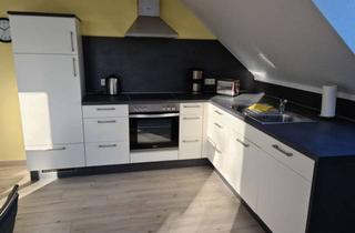 Wohnung kaufen in 26427 Esens, Geschmackvolle 4-Zimmer-Dachgeschosswohnung mit gehobener Innenausstattung und EBK in Esens