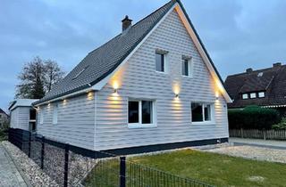 Haus kaufen in 24790 Schülldorf, Schülldorf - Doppelter Wohntraum: Stilvoll saniertes Zweifamilienhaus